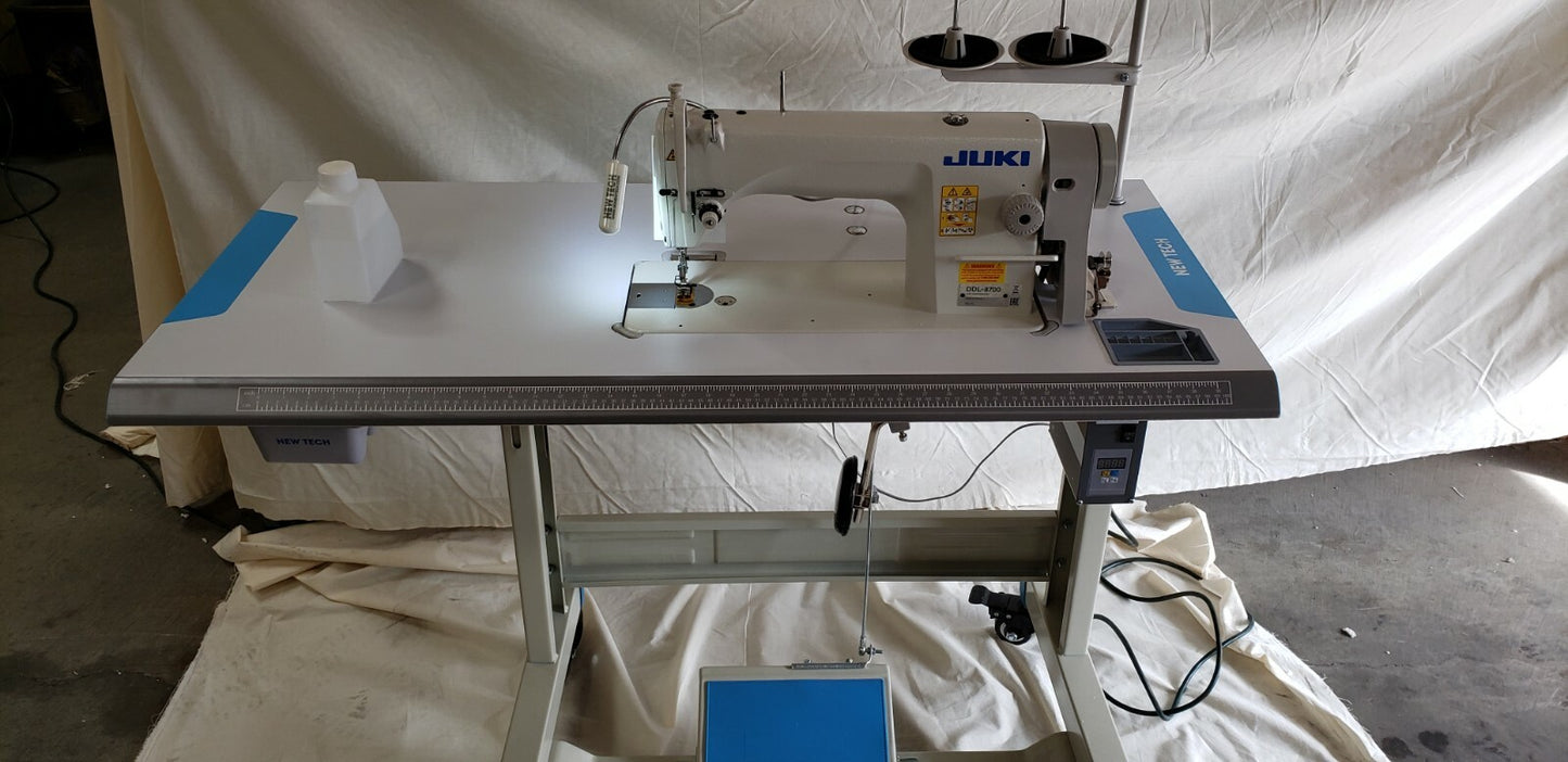 Juki DDL-8700 SEWING MACHINE WITH T-LEGS STAND ,CASTERS,SERVO MOTOR LED LAMP