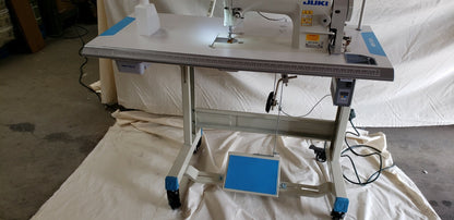 Juki DDL-8700 SEWING MACHINE WITH T-LEGS STAND ,CASTERS,SERVO MOTOR LED LAMP