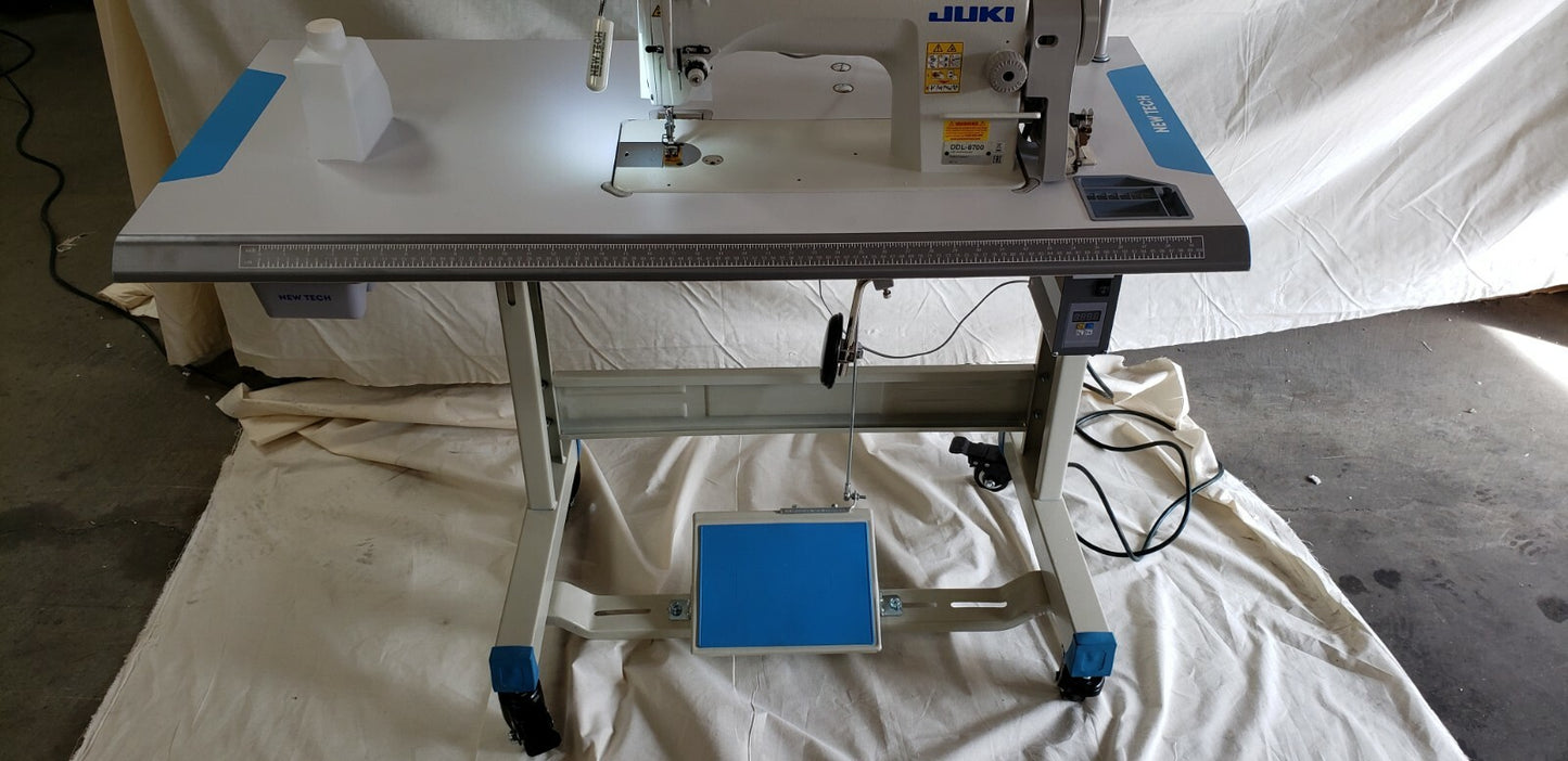 Juki DDL-8700 SEWING MACHINE WITH T-LEGS STAND ,CASTERS,SERVO MOTOR LED LAMP