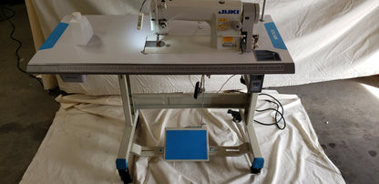Juki DDL-8700 SEWING MACHINE WITH T-LEGS STAND ,CASTERS,SERVO MOTOR LED LAMP