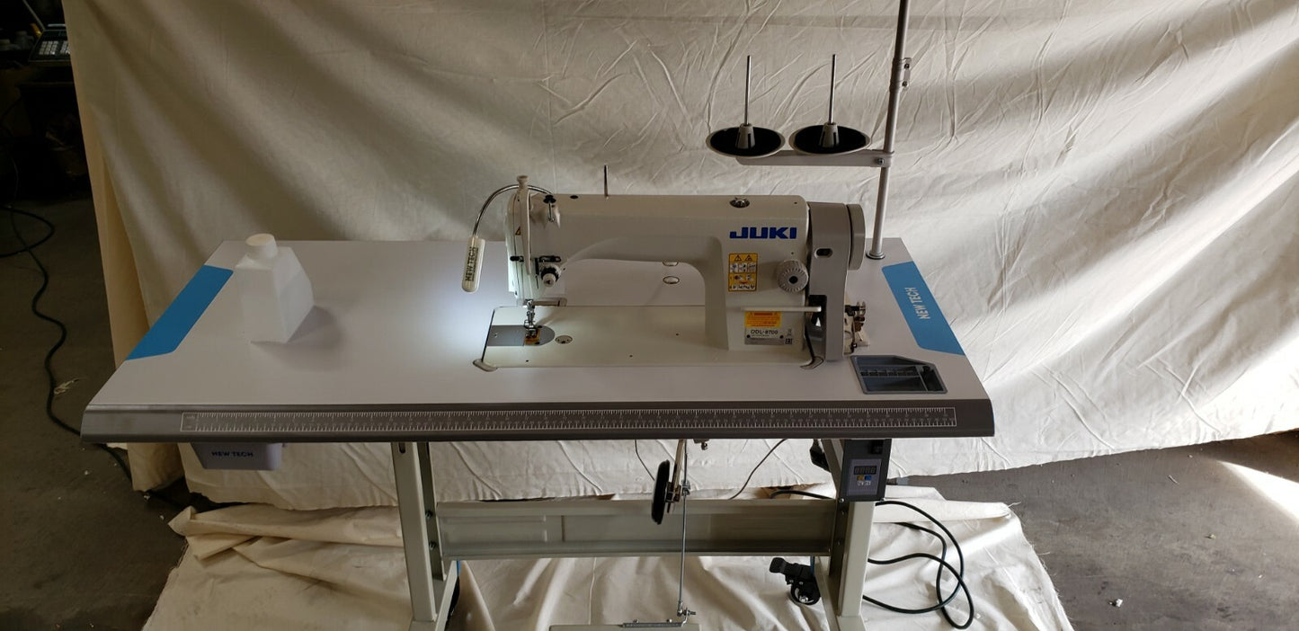 Juki DDL-8700 SEWING MACHINE WITH T-LEGS STAND ,CASTERS,SERVO MOTOR LED LAMP