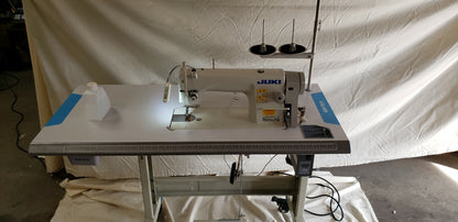 Juki DDL-8700 SEWING MACHINE WITH T-LEGS STAND ,CASTERS,SERVO MOTOR LED LAMP