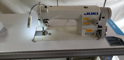 Juki DDL-8700 SEWING MACHINE WITH T-LEGS STAND ,CASTERS,SERVO MOTOR LED LAMP