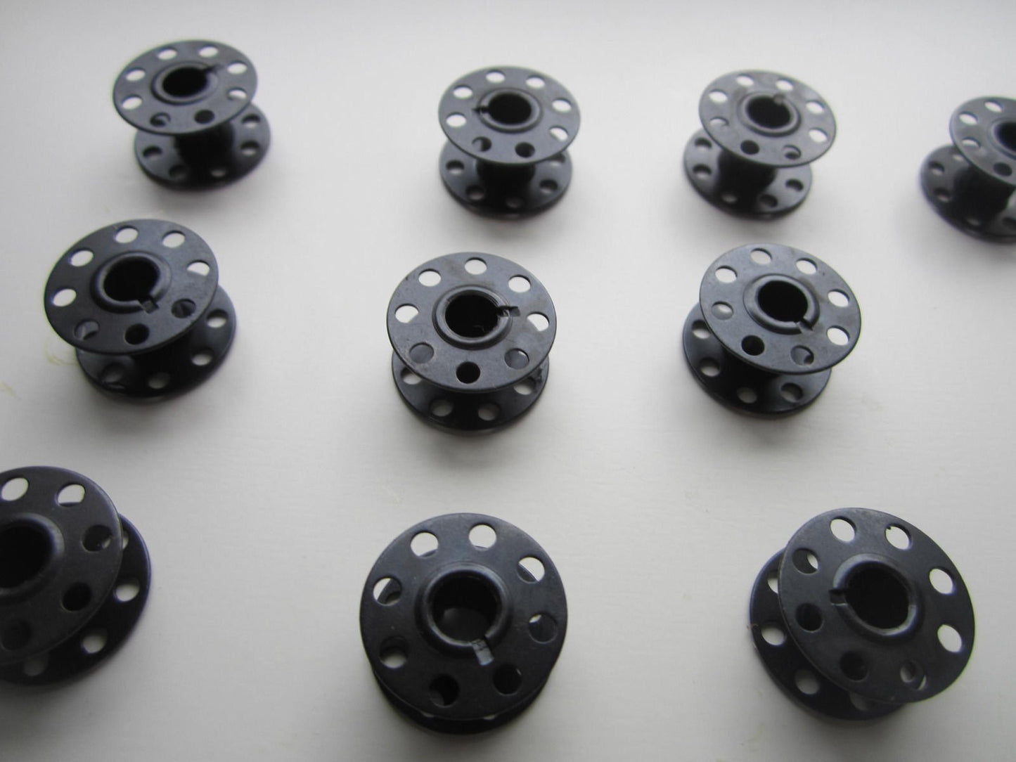 BOBBIN, STEEL 10 EACH #23500 fits SINGER 71 CLASS BUTTON HOLE supplier:sterling_sewing